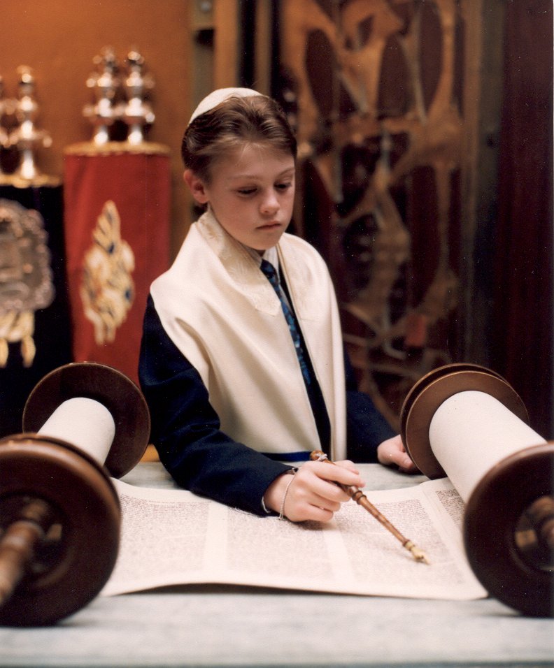 Bar Mitzvah boy reading from the Torah